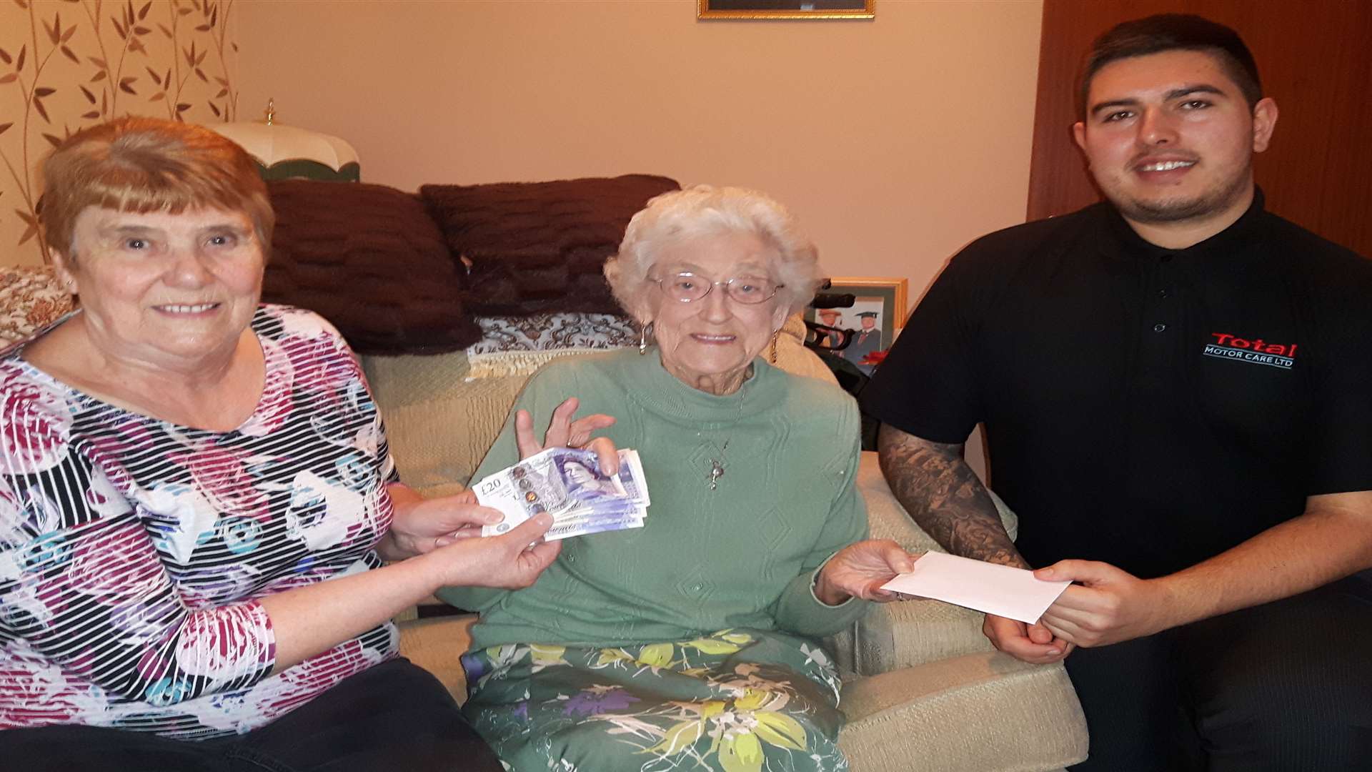 Well-meaning readers Margaret Edwards of Deal Icebreakers and Dan Reid on behalf of Total Motor Care have reimbursed Margaret Philpott (centre) after she had £100 stolen from her purse in a Deal charity shop