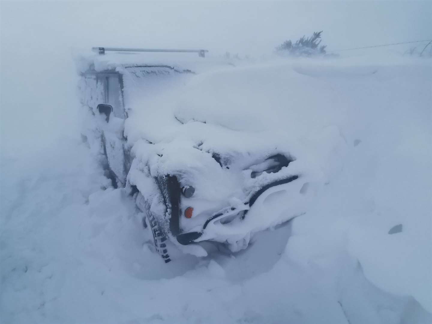 The Landrover when they first came across it. Less than an hour later it was almost entirely buried