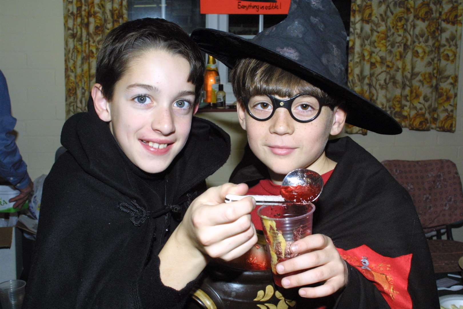 Nicholas Crawford 10, and Felix Southern 9, with some Harry Potter jelly at the Christmas Fayre at Hartlip Village Hall in December 2001