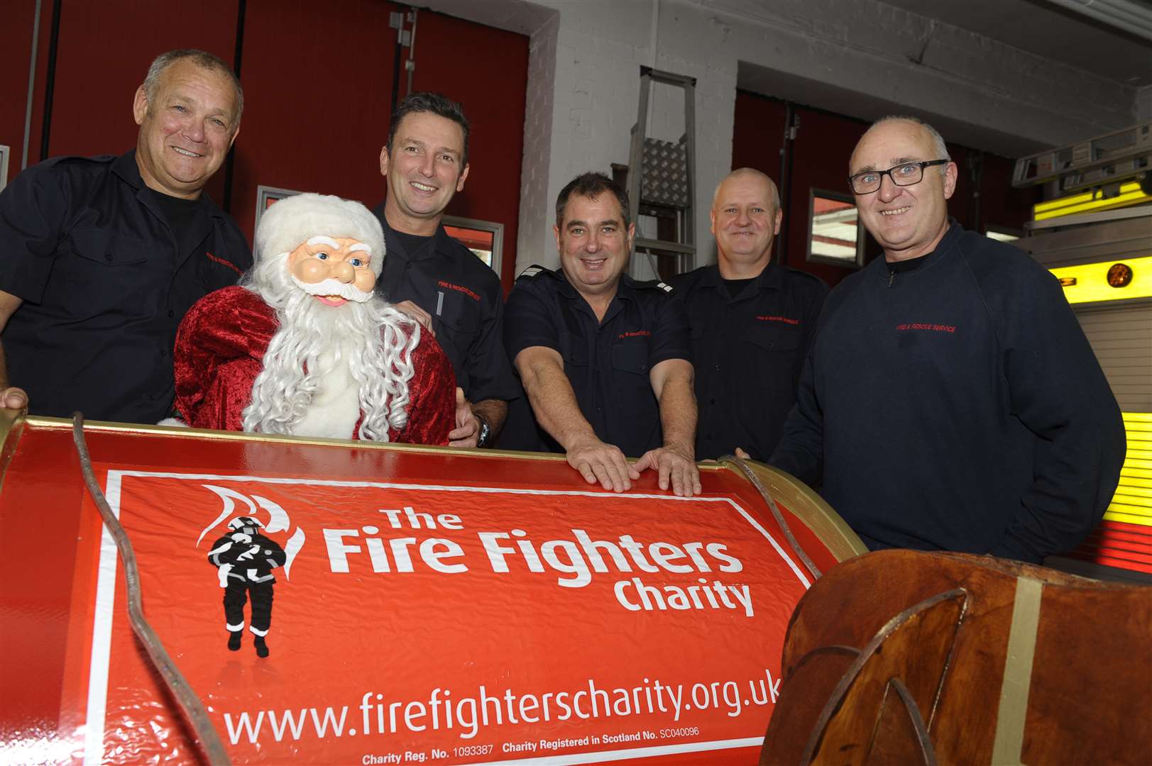 Firefighters from Blue Watch preparing for their festive open afternoon