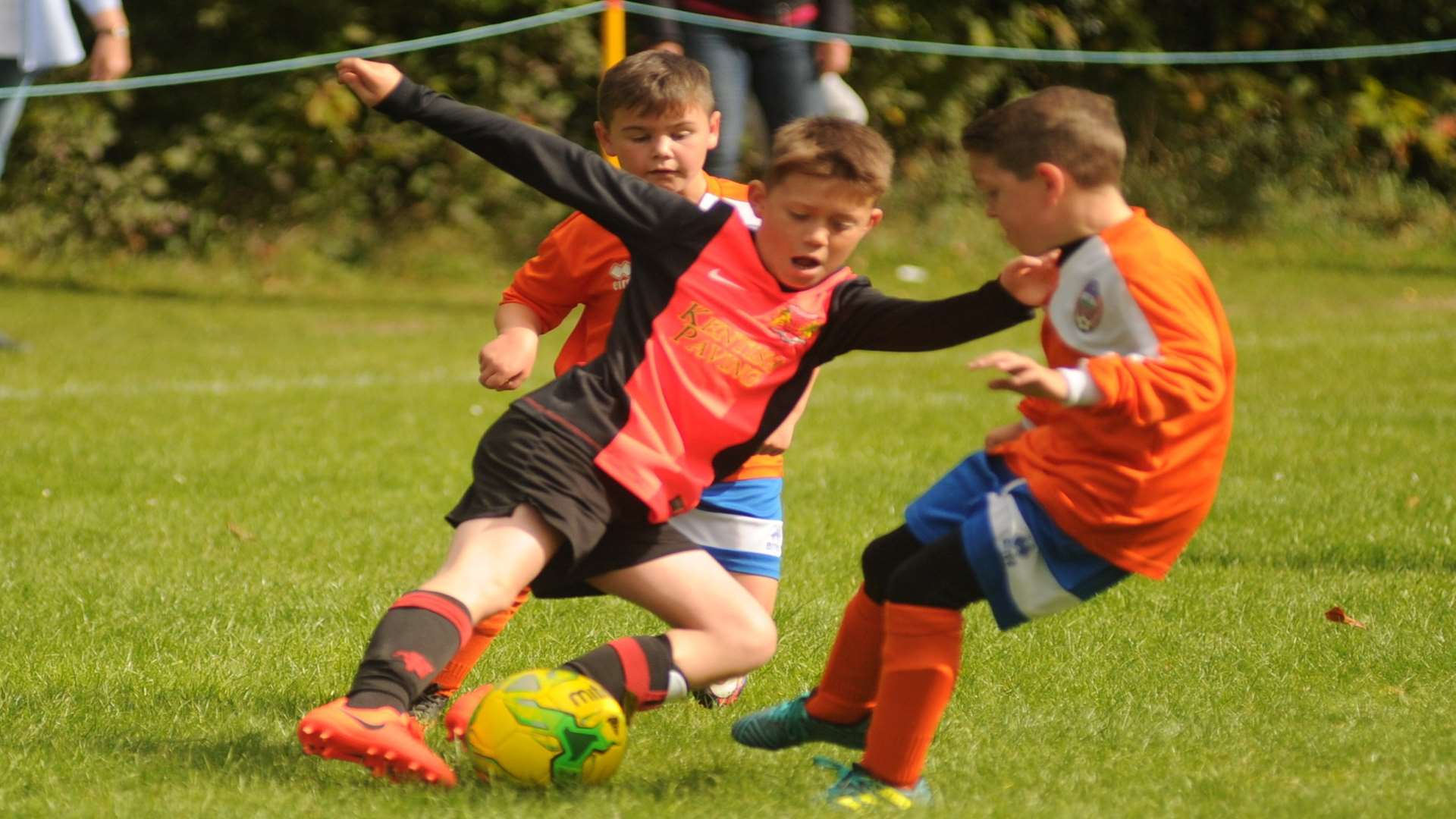 Cuxton 91 Dynamos under-10s (orange) and Woodcoombe Youth battle it out Picture: Steve Crispe
