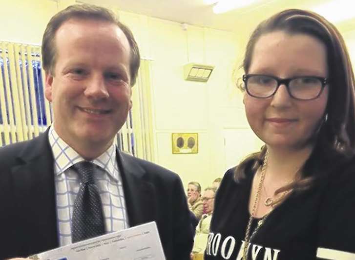 Petition leader, Millie Cole, presents the 117 strong document to MP Charlie Elphicke