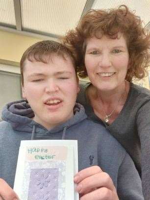 Nick Harvey with his mum, Heather, making Easter cards