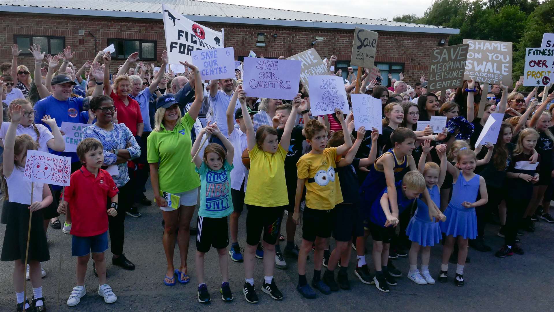 School children joined in the protests and waved placards and posters. Photo: Anna Roberts