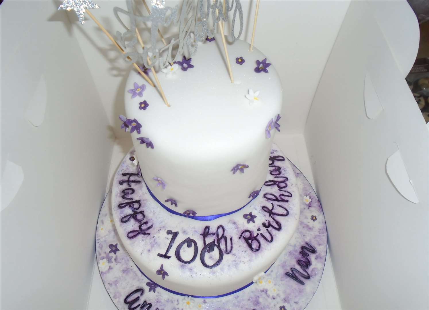 A beautiful cake helped with the celebrations. Picture: Gardenia House