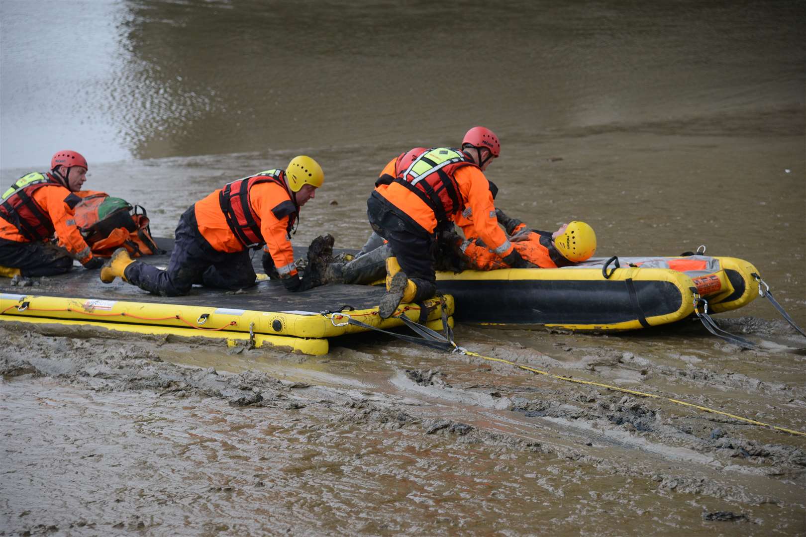 A fire crew training for a mud rescue. Picture: Gary Browne