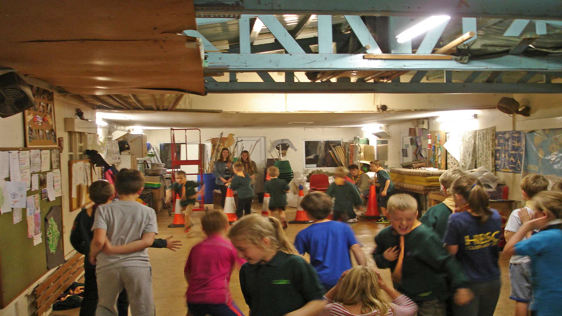 The Charing cubs playing their favourite game...a relay avoiding the leaky roof...
