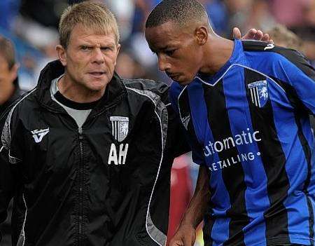 Andy Hessenthaler talks tactics with Tony Sinclair during their 1-0 defeat at home to Lincoln.