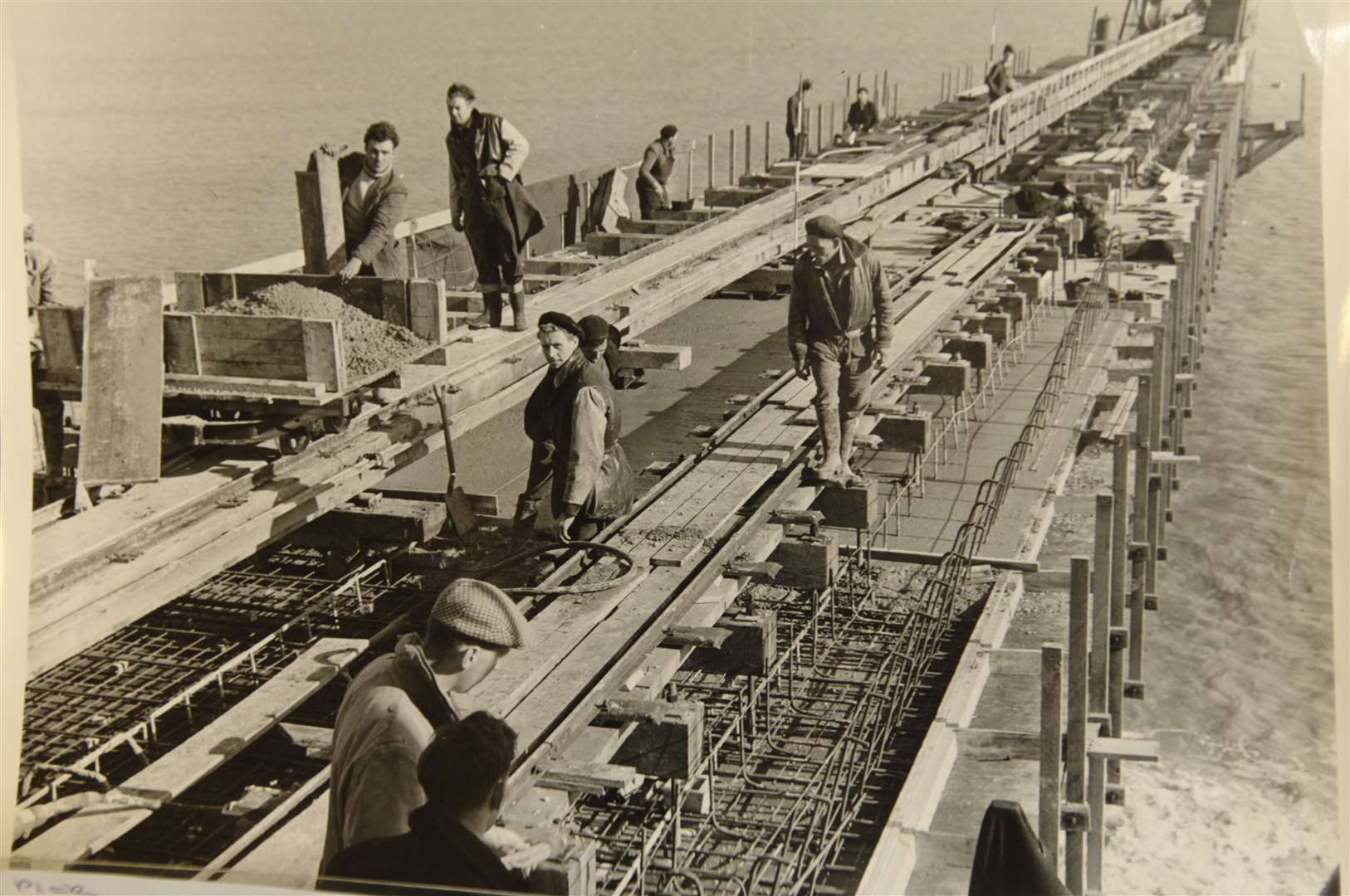 Building Deal Pier in 1955. It opened two years later. Picture: Terry Scott / Deal Library