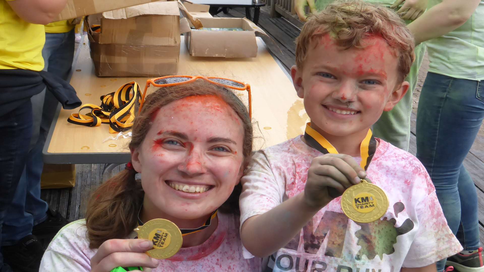 Mother Emma and son Fin Rosen, 5 - the youngest participant at the KM Colour Run 2016 - of Deal. with their commemorative medals following the event.