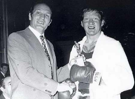 John "Ginger" Rice with British boxing legend Henry Cooper at a tournament in the 1970s