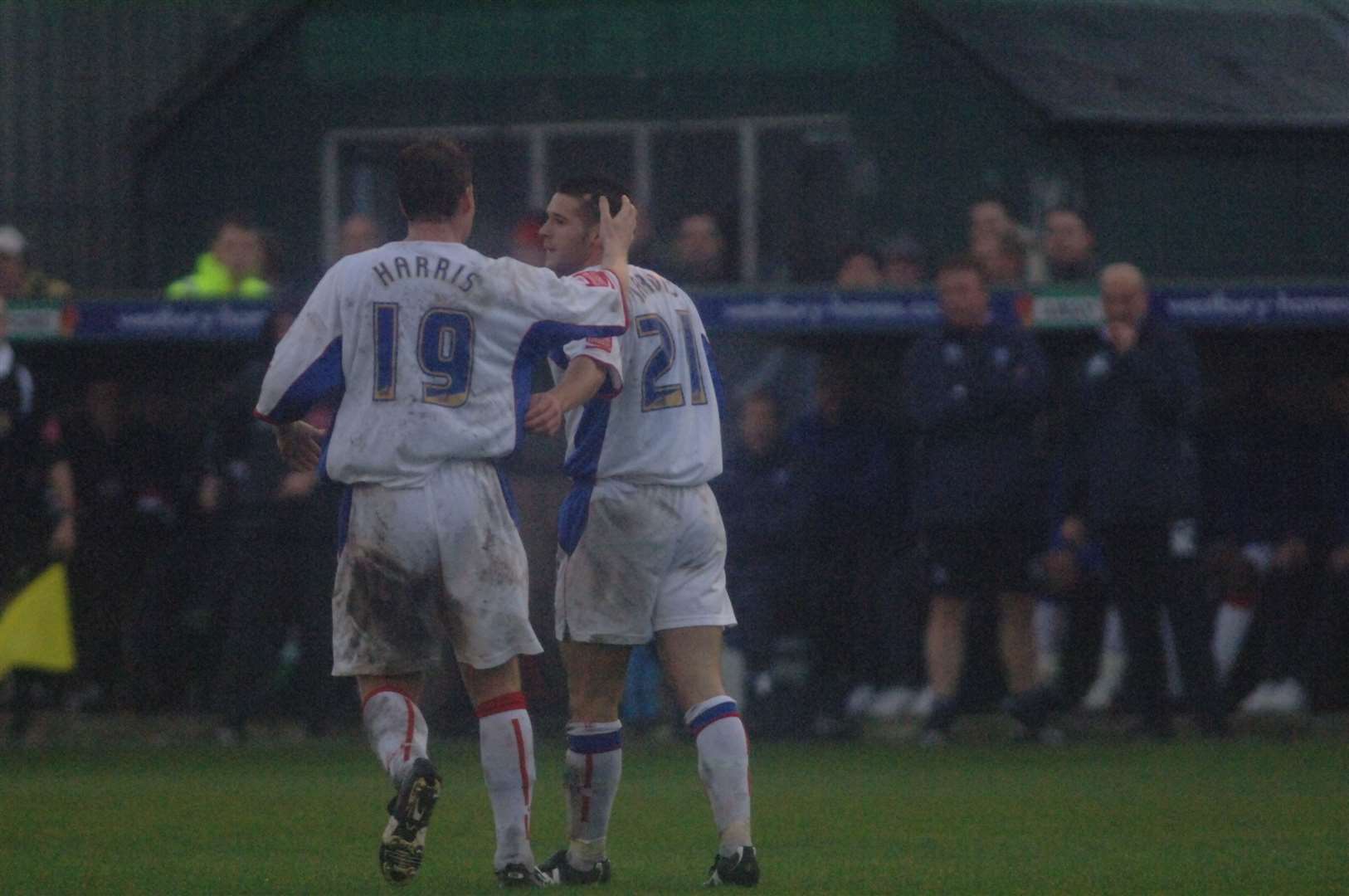 Neil Harris congratulates Matt Jarvis as he scores Gills' equaliser at Burscough in the FA Cup - an afternoon that ended in defeat