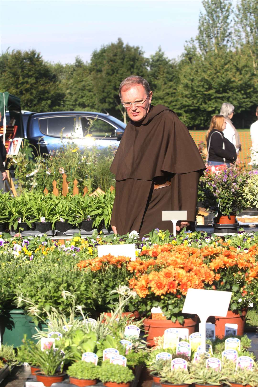 Father Francis at a farmer's market held at Aylesford Priory