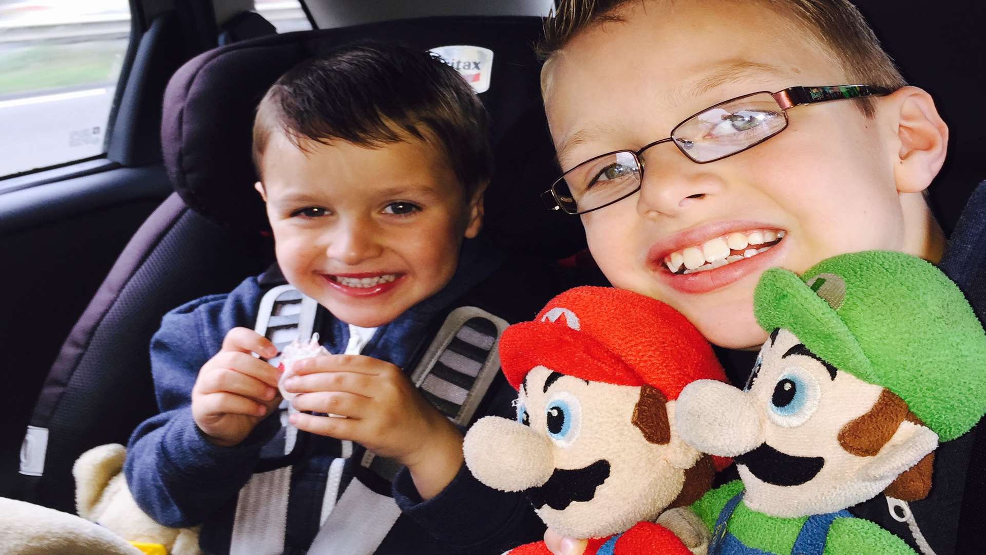 Oliver, 4, and Billy, 7, took Mario and Lugi everywhere with them.