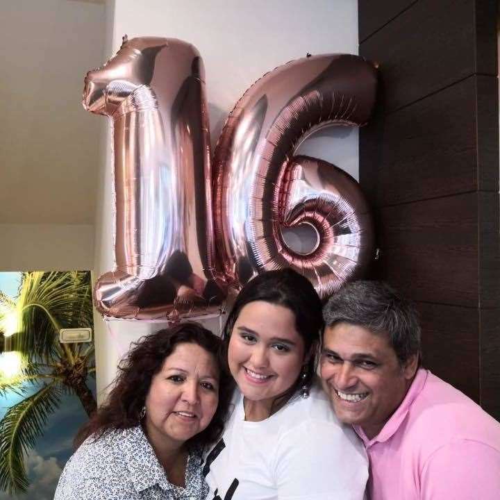 Lorry driver Mario Pinto with his wife Sirlei and daughter Flavia at her 16th birthday in June. Picture: Facebook (16496350)