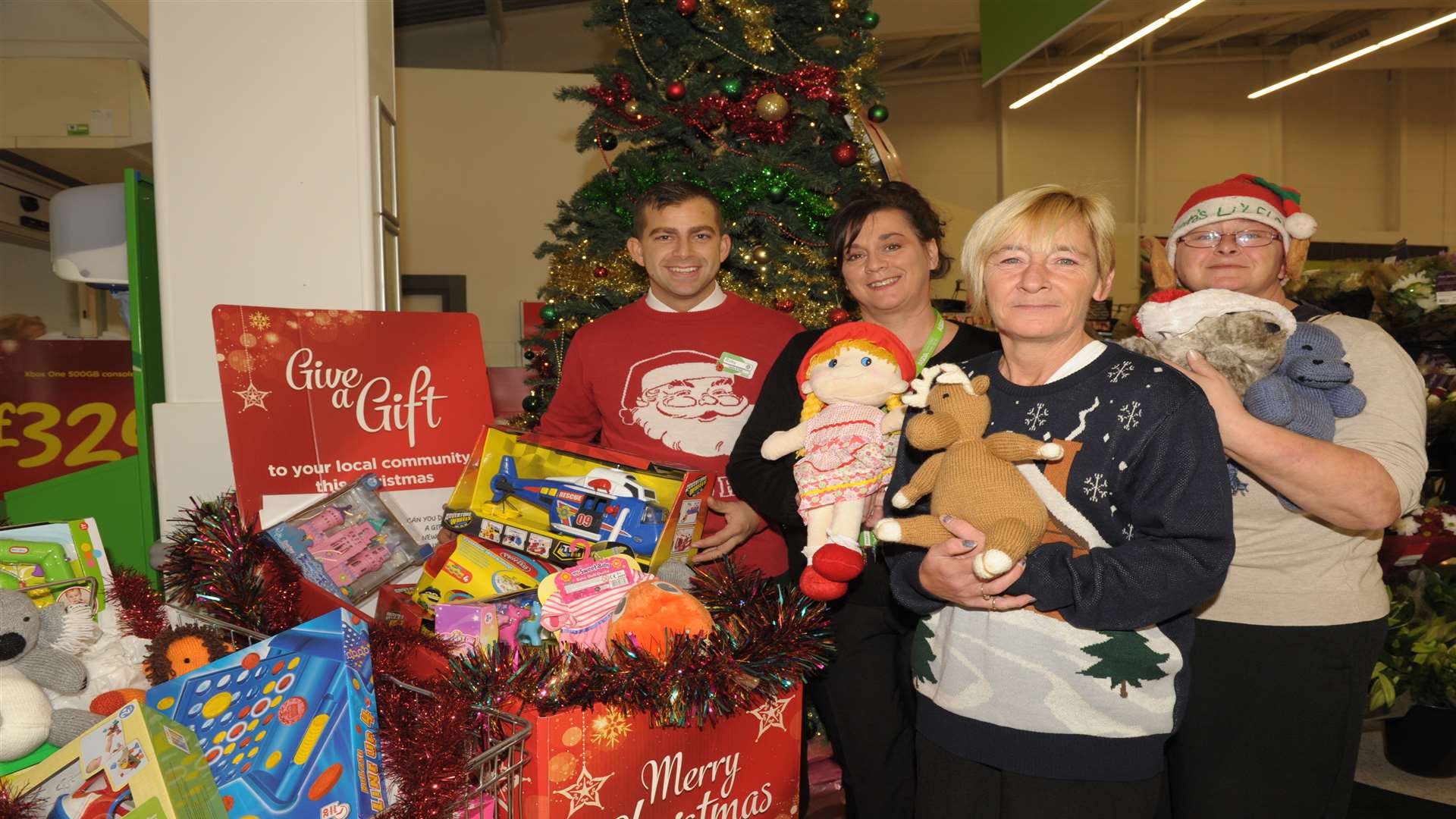 staff at Asda in Chatham with the donated toys.