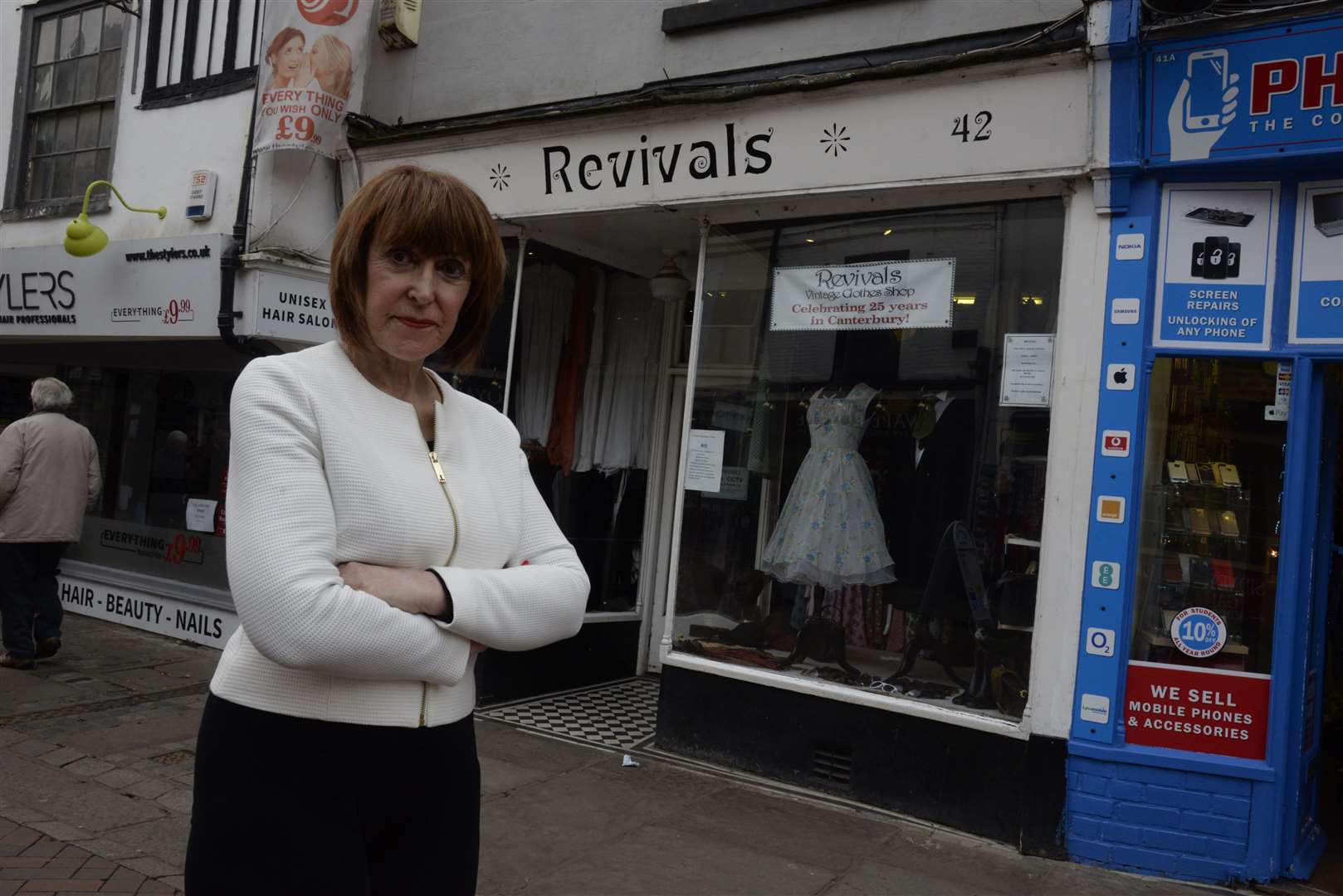 Debbie Barwick outside vintage clothing shop Revivals in St Peter's Street, Canterbury, which she ran for 33 years. Picture: Chris Davey