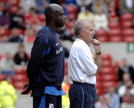 Iffy Onuora and Mick Docherty watch the Gills slip to a 4-0 defeat at Forest on Saturday
