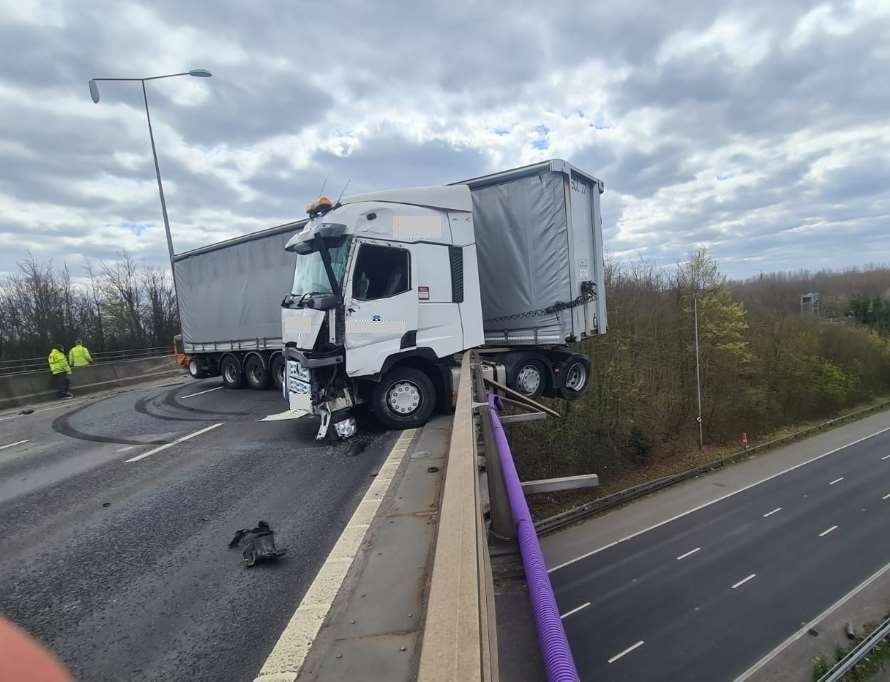 The lorry is precariously perched Picture: Highways England