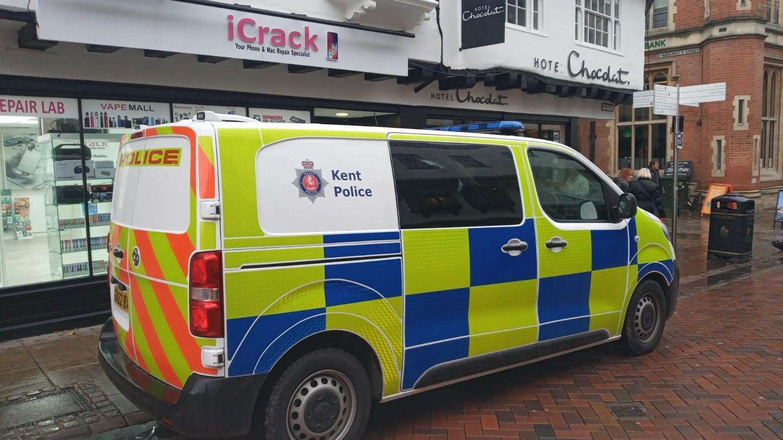 Police at the iCrack store in Canterbury yesterday