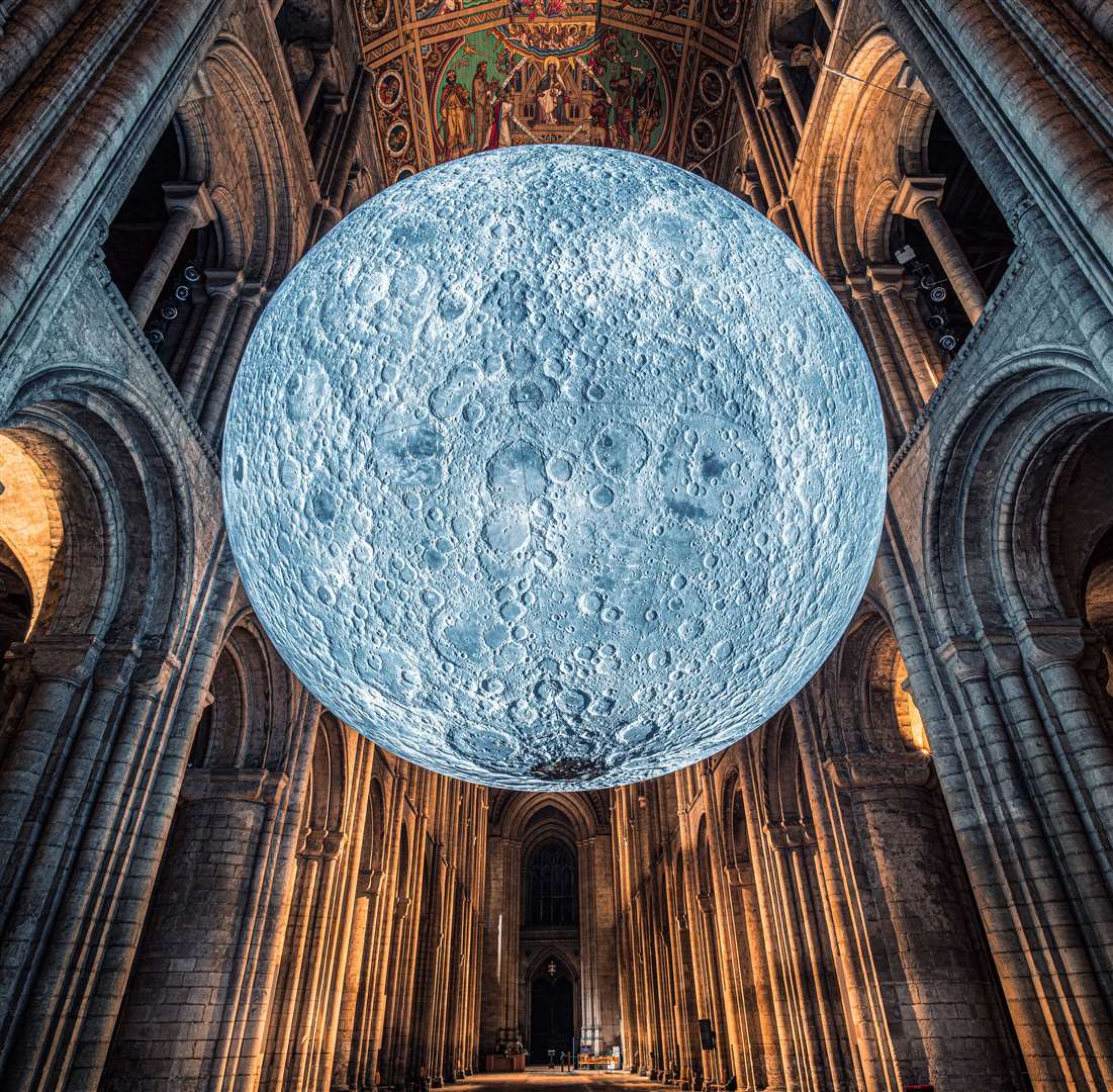 The huge, glowing moon suspended in Rochester Cathedral
