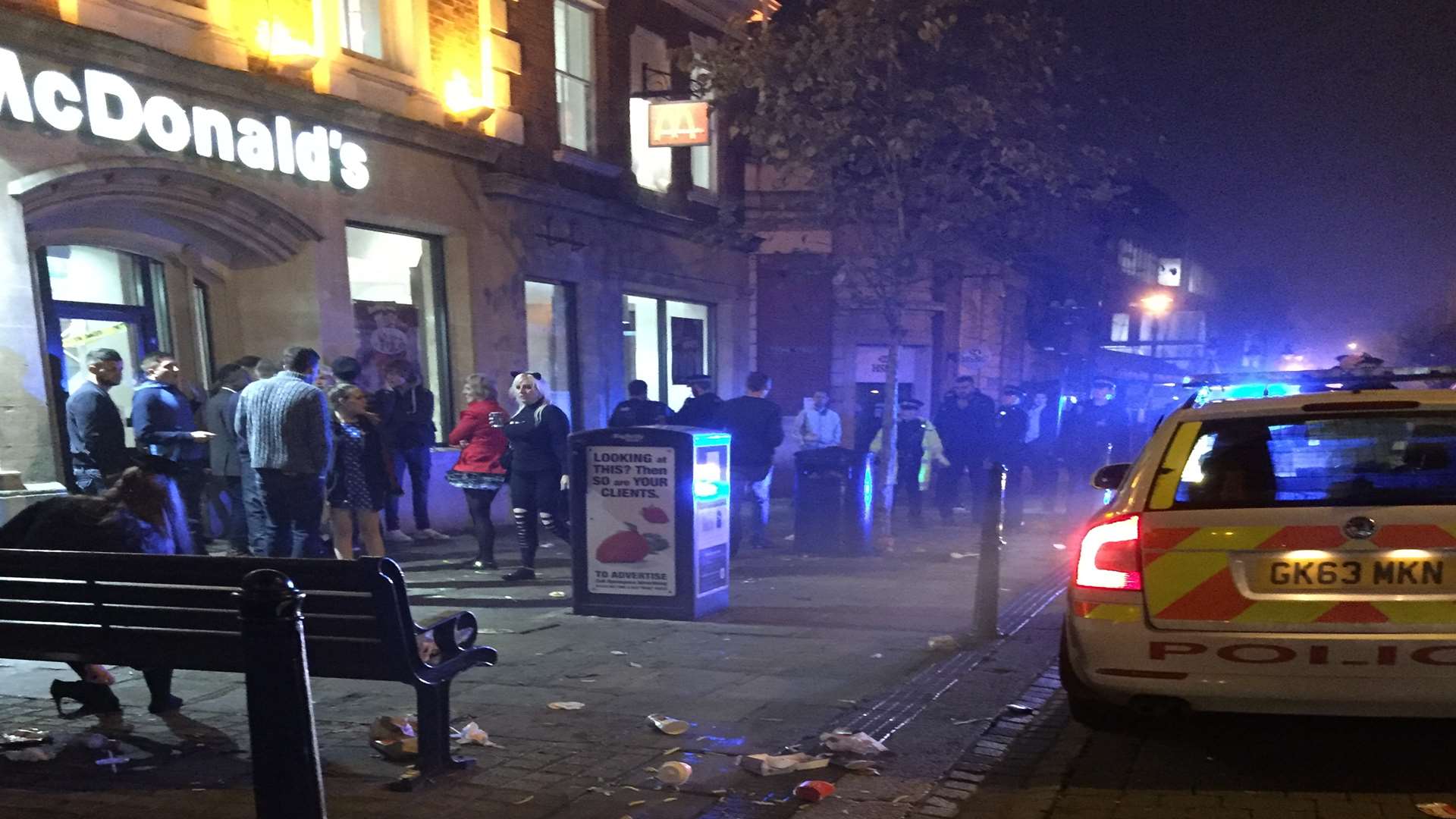 Police outside McDonald's in New Road, picture: Darren Hilbert