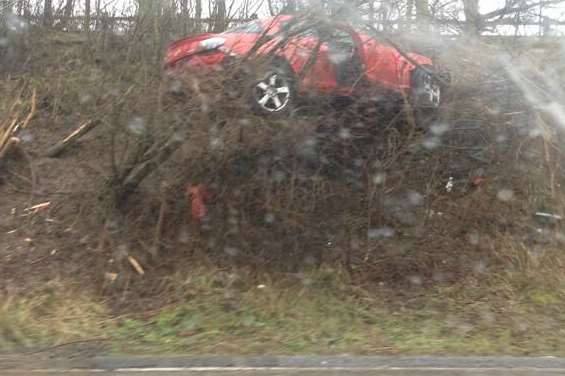 A car was left stuck on the M2 between Sittingbourne and Faversham. Picture: Paul Browning