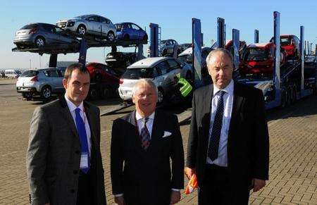 Bob Neill, centre, with Howard Nash, left, UK automotive director and James Humphrey, site manager for GEFCO, Sheerness