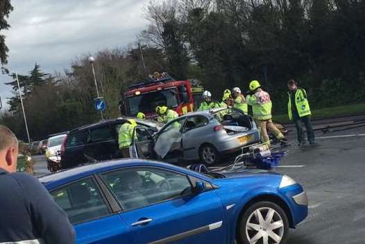 Road reopened after a man and woman were cut free from their cars and taken to hospital. Picture: Ronnie Carman