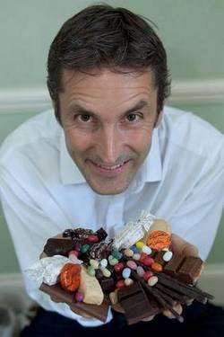 Angus Kennedy, 47, had to give up his job as a real-life Willy Wonka working as a chocolate taster. Picture: SWNS