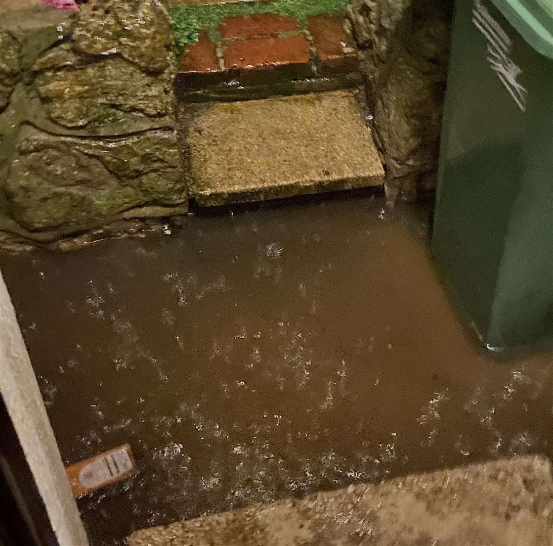 Water came very close to entering Wendy Llewellyn's home in Hythe. Picture: Wendy Llewellyn