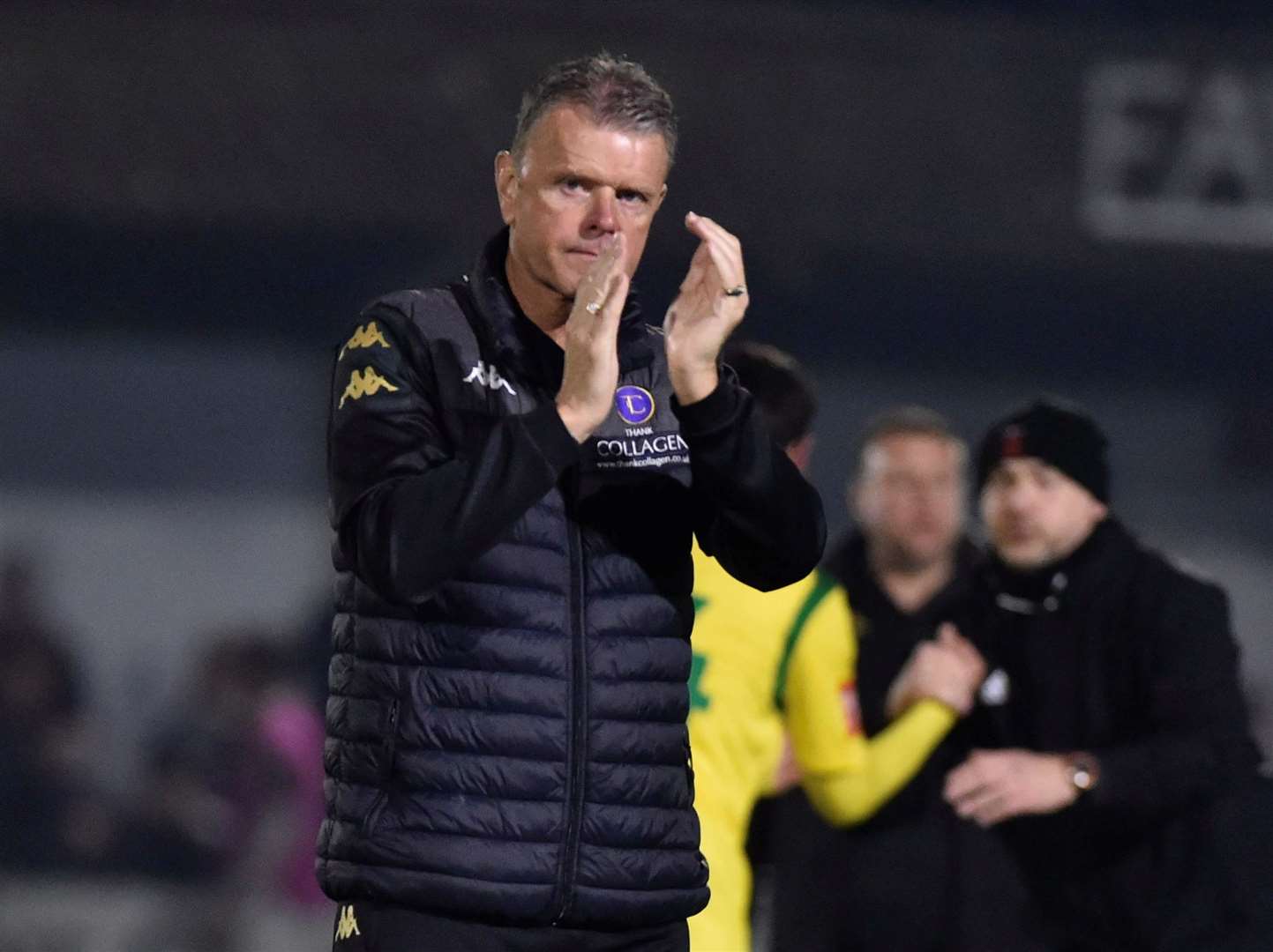 Dejected Faversham boss Tommy Warrilow applauds the fans after again suffering play-off heartache. Picture: Ian Scammell