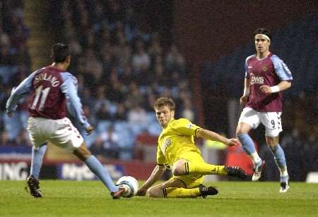 Hermann Hreidarsson puts in a tackle on Nolberto Solana during Wednesday's 0-0 draw at Villa Park. Picture: MATT WALKER