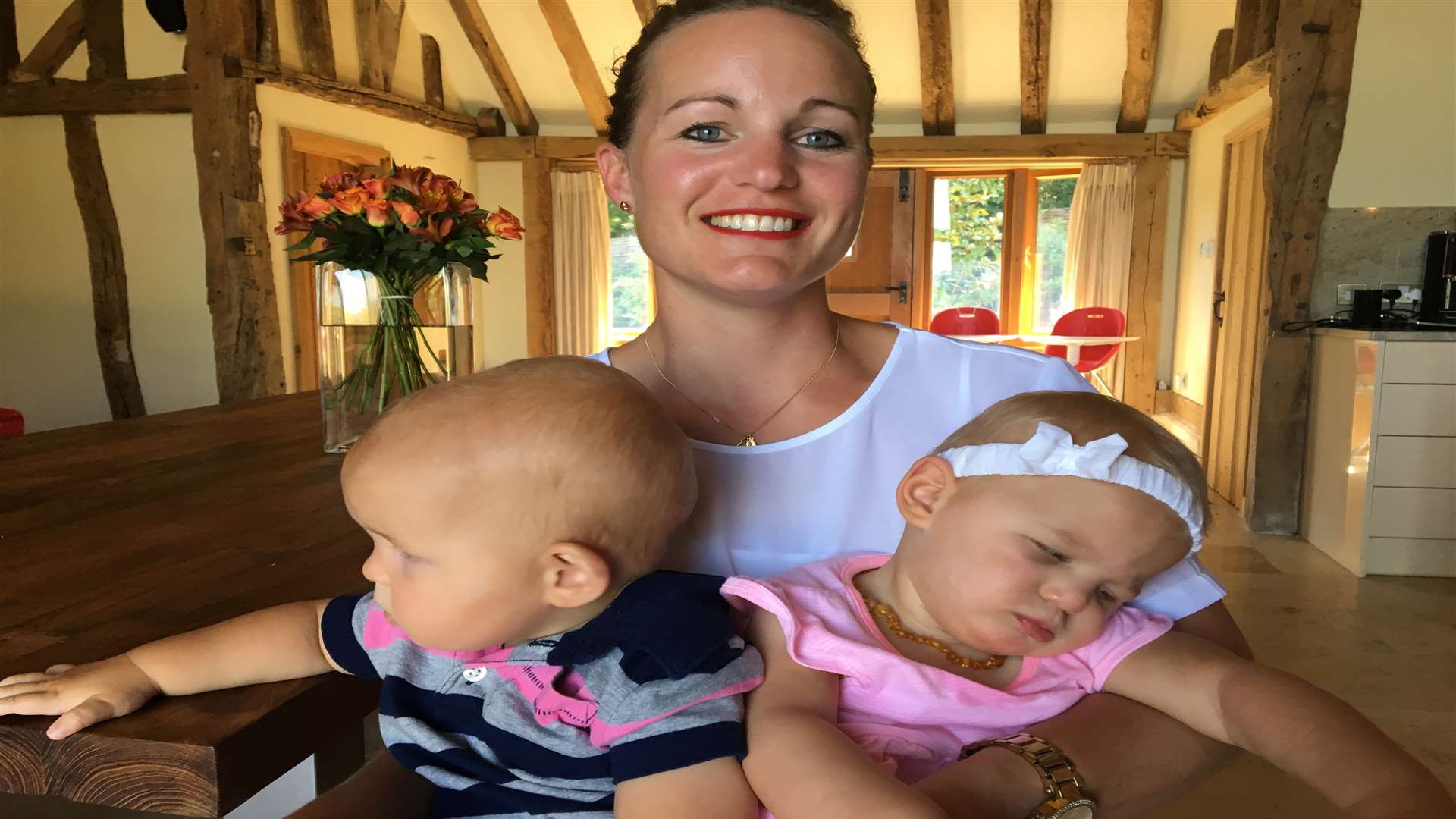 Libby Augustin with twins Zeal and Izola