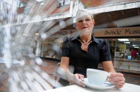 Joint owner Joanne Povey next to their smashed in window at The Bay Leaf
