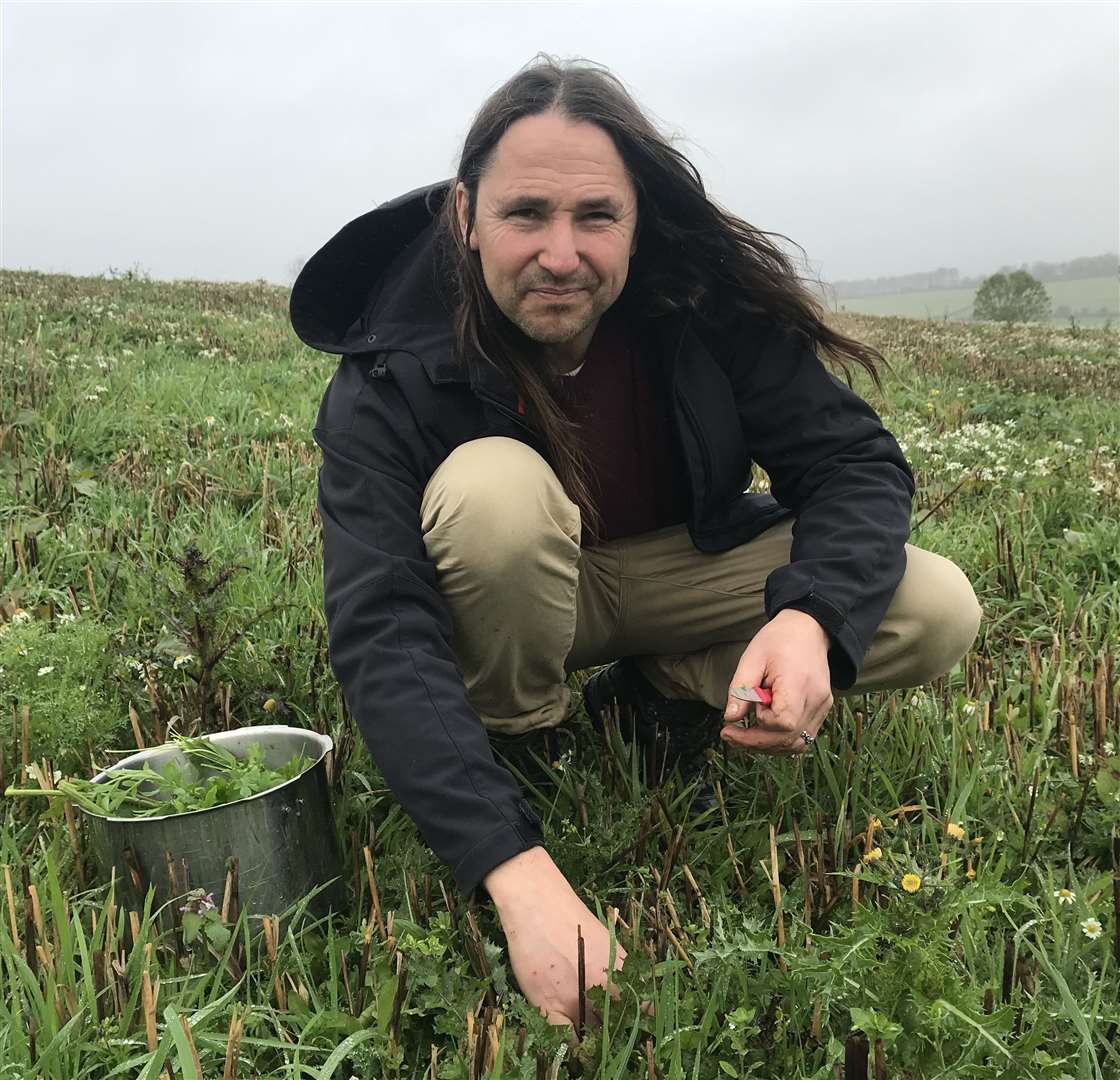 Miles Irving out foraging in a field near his home
