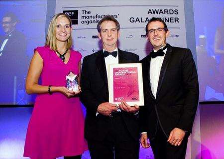 GP Acoustics (KEF), named UK best manufacturer. From left: Barry Dock, GP Acoustics head of project engineering, Katy Smith, marketing assistant, and Phil Burgess, regional vice president of award sponsor