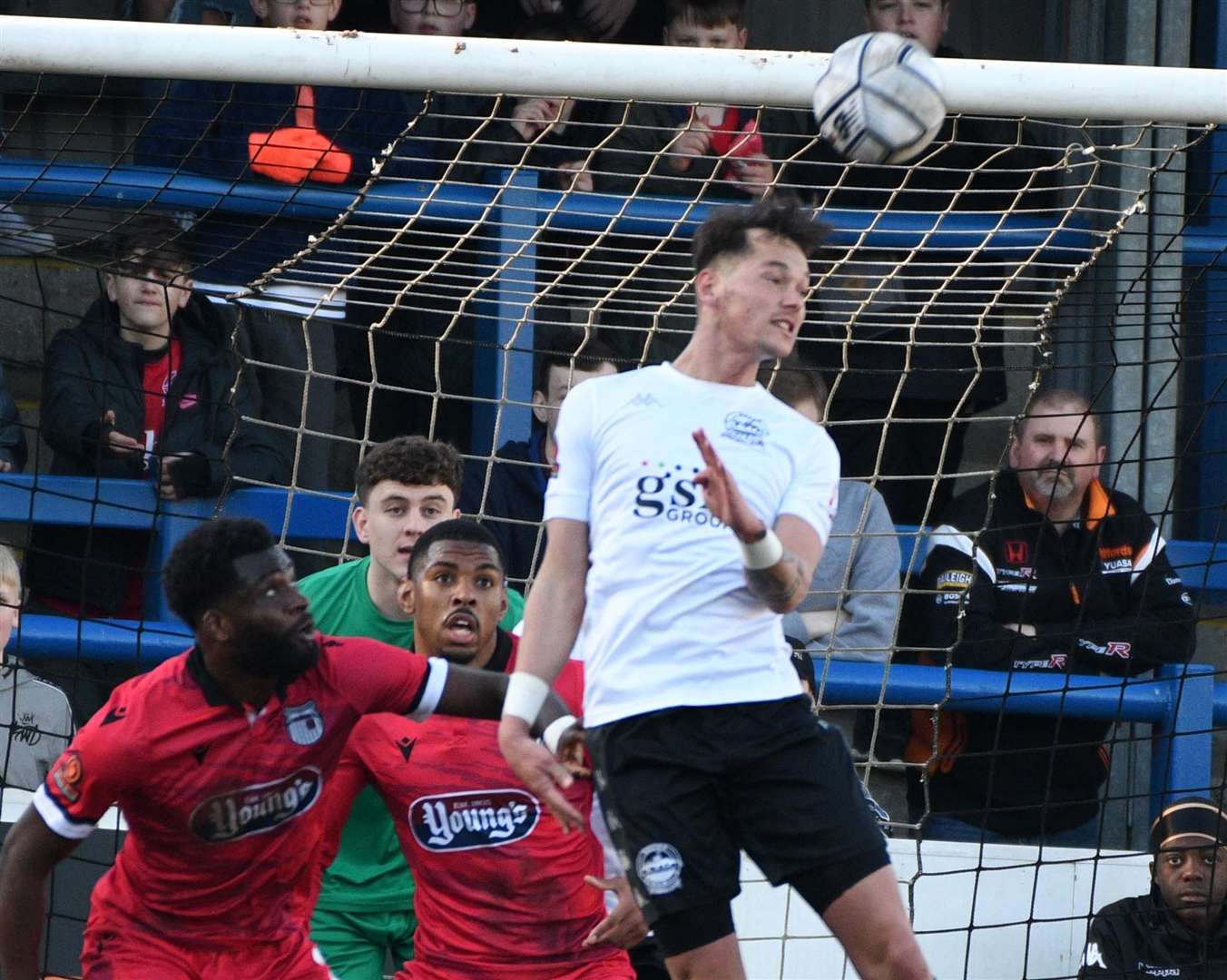 Striker Alfie Pavey clears the ball during Dover's defeat to Grimsby at Crabble on Saturday. Picture: Barry Goodwin