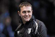 Assistant manager Ian Hendon is all smiles after another Gillingham win