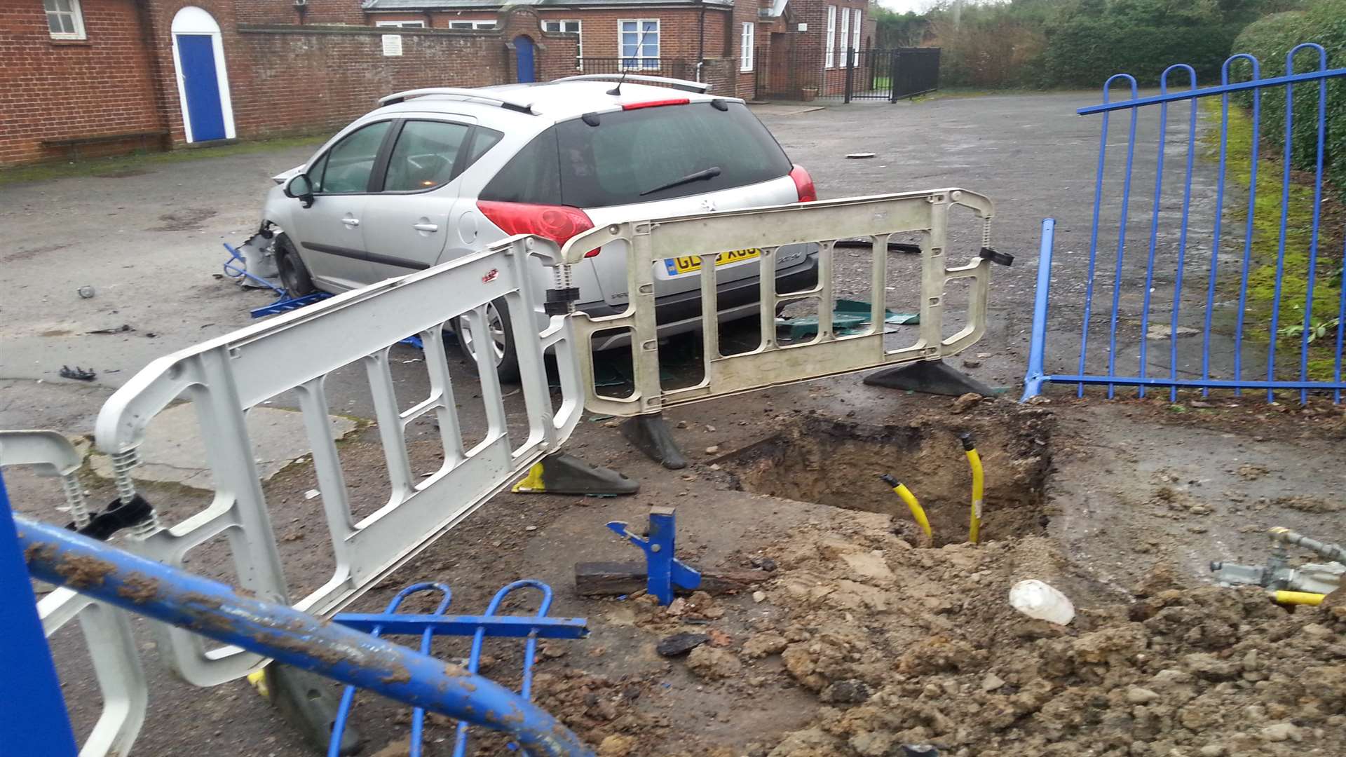 The Peugeot left the road and hit a gas main. Picture: Chris Davey