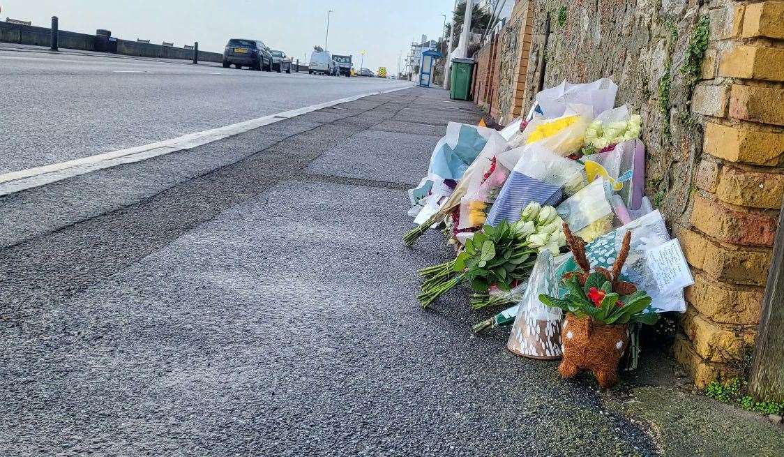 Floral tributes outside William Brown's home in Sandgate Esplanade, following his tragic death