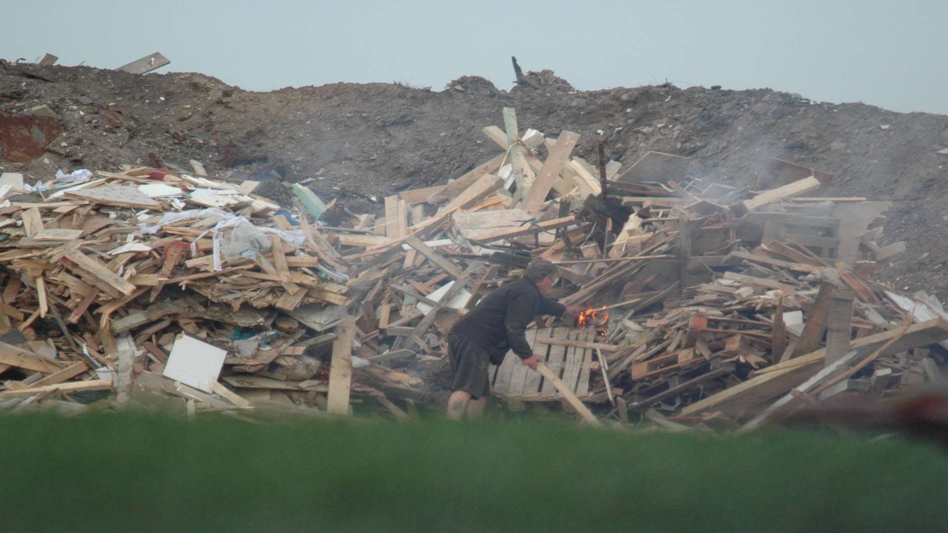 Photographs taken by environmental officers investigating illegal waste dumping at Marlow Farm near Lenham