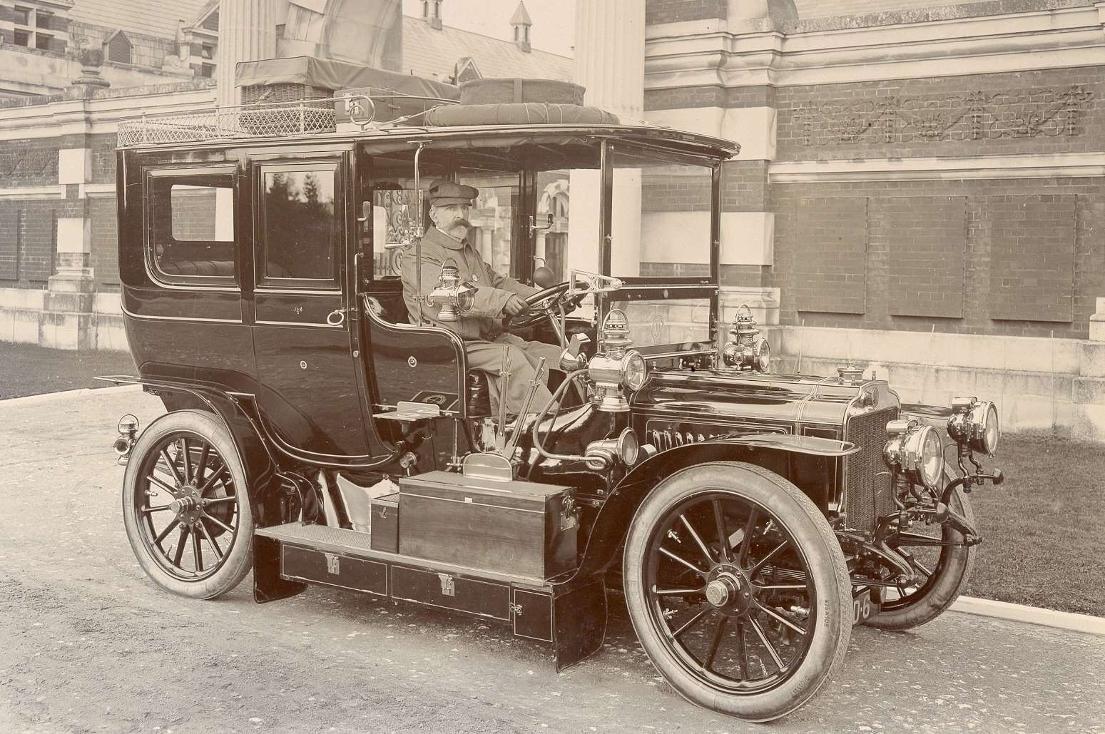 Sir David Lionel Salomons driving one of his cars