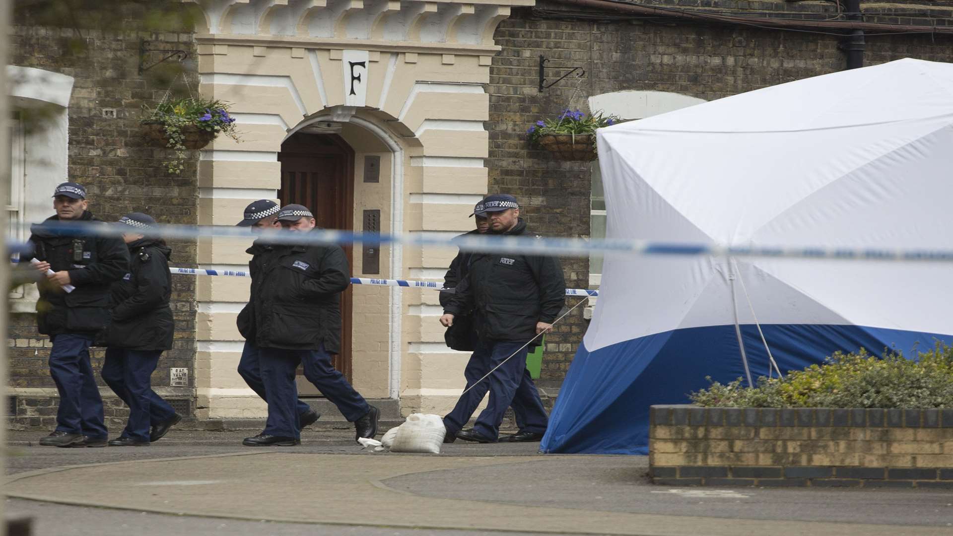 A forensics tent in the street. Picture: SWNS