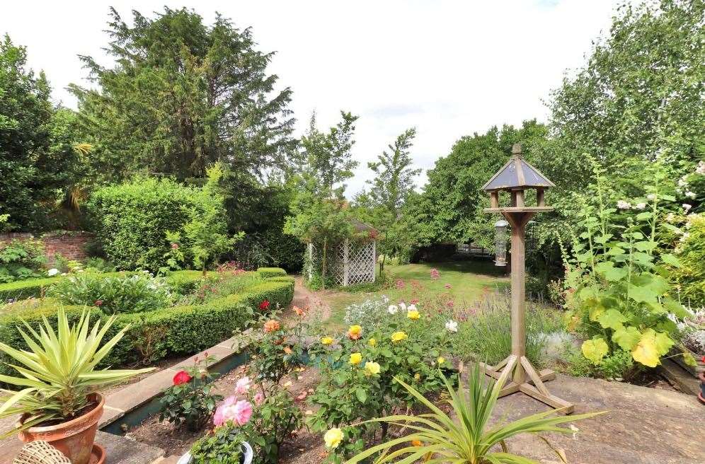 The beautiful gardens are a real highlight of this unique property. Picture: Savills