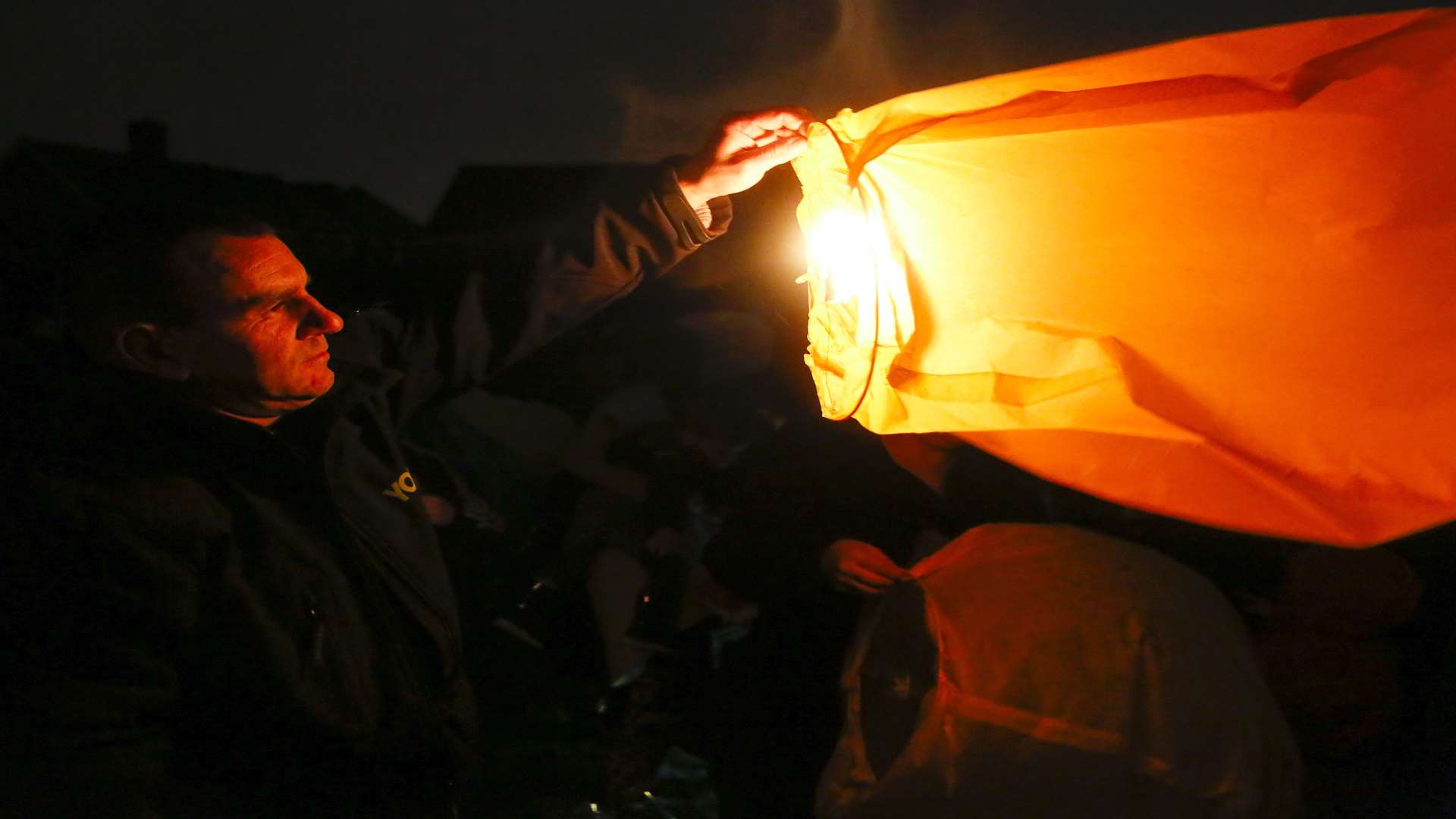 Family and friends battled bad weather to release the lanterns