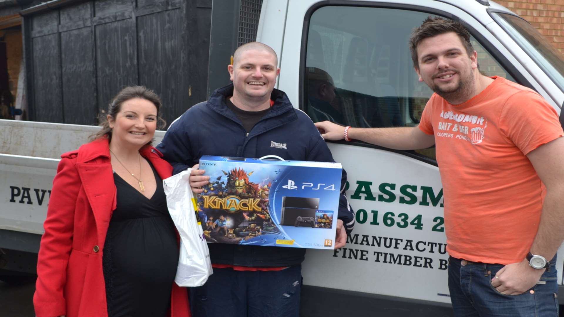 James Hunt from Strood is given his new PS4 from kmfm's Rob and Emma