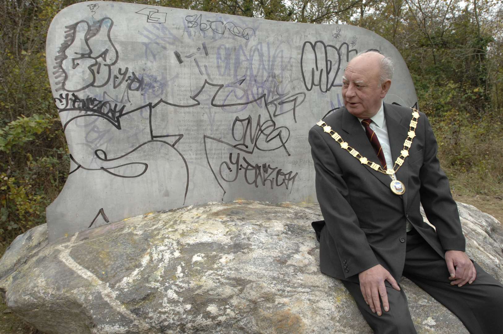 Swanscombe Heritage Park was hit by a spate of graffiti back in 2008. Picture shows mayor Bryan Read at some of the damage. Picture: Grant Falvey
