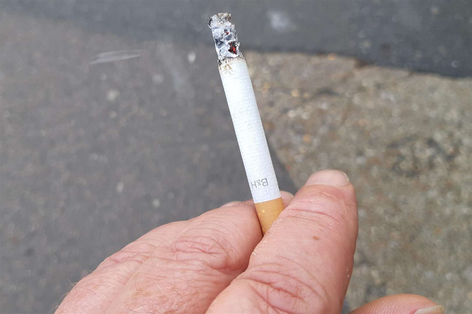 Smokers were fined for discarding ther cigarettes as litter. Library picture