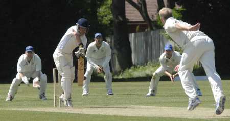 Blackheath's Chris Willetts under pressure from Ryan Minter as Canterbury's keeper Simon Smith and the slips wait for a chance at Polo Farm on Saturday